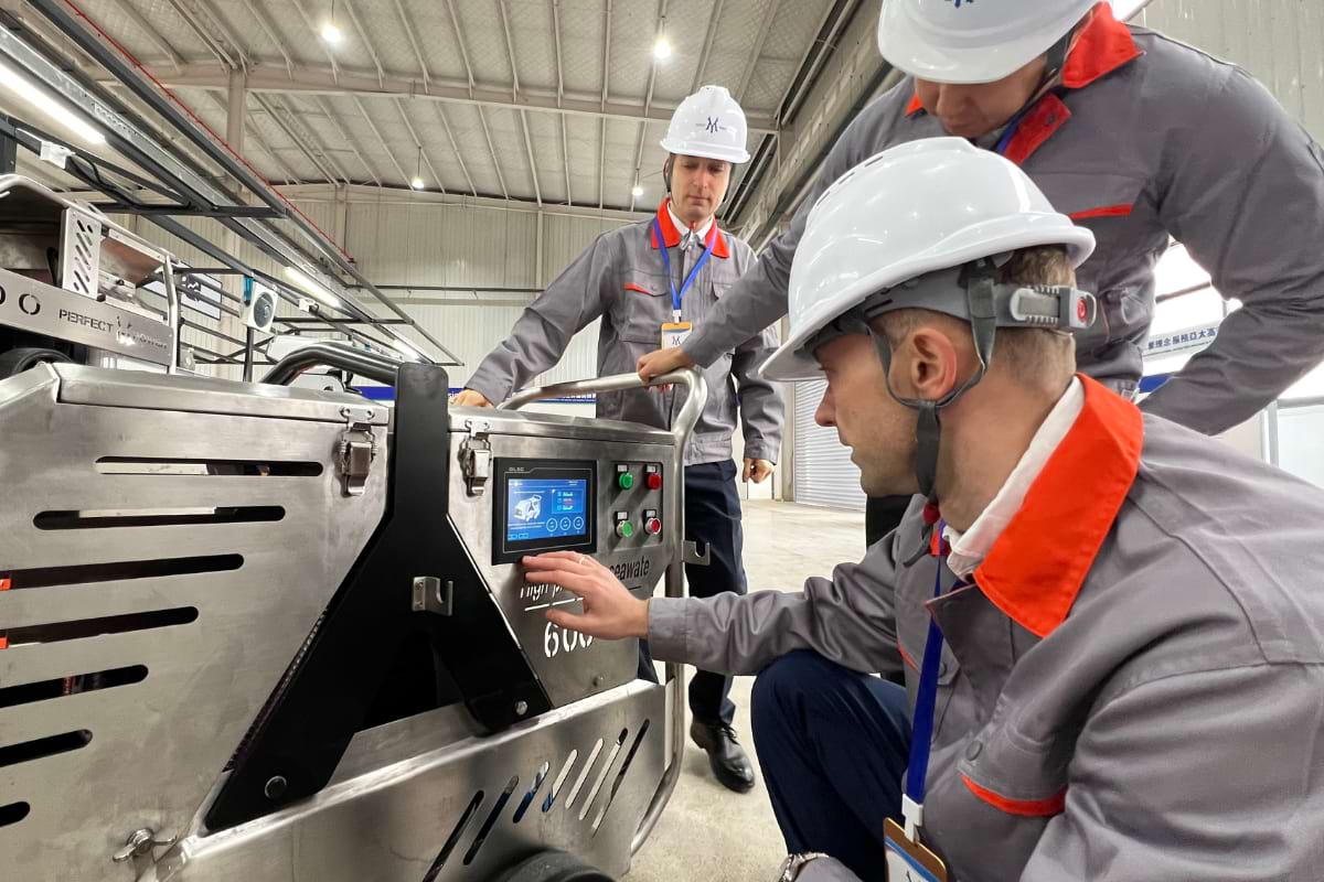 On-site hydraulic pump equipment inspection by technicians